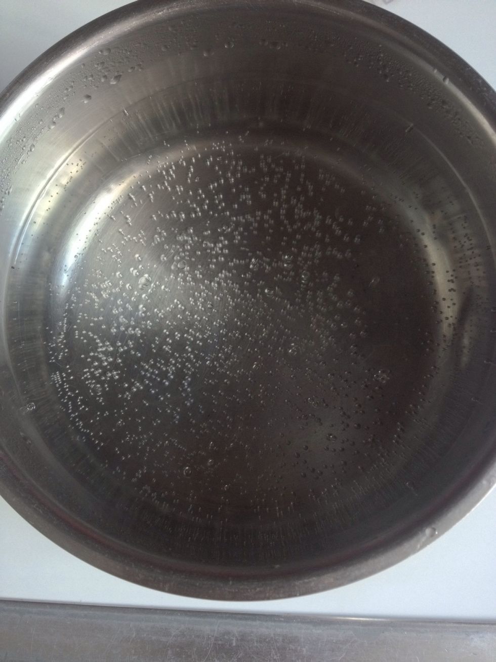 In a small-medium saucepan put water in high for it boil