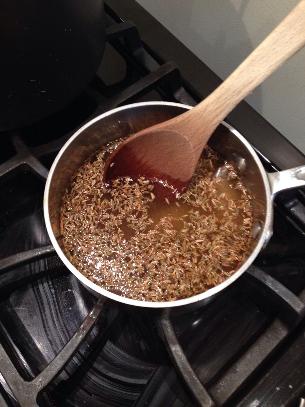 In a small non-reactive saucepan, combine the vinegar, water, cumin seeds, sugar and salt. Bring to a simmer and stir until the sugar and salt dissolve about 4 minutes.