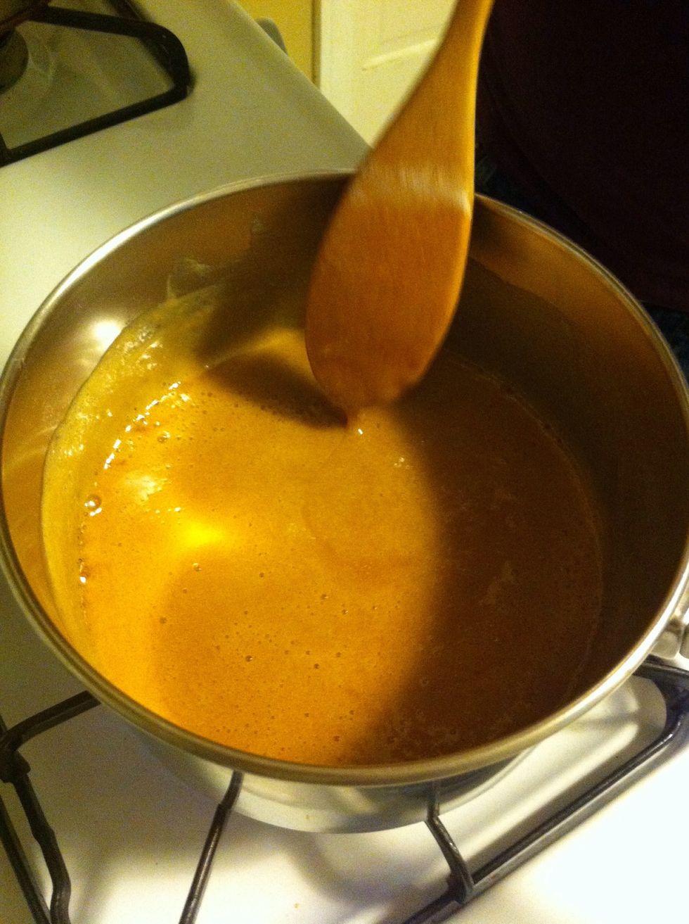 In a small pan over medium heat combine 1 1/2 cup of caramel topping and 1/2 cup of flour. Bring to the boil stirring constantly. Boil for 2-3 minutes or until slightly thickened