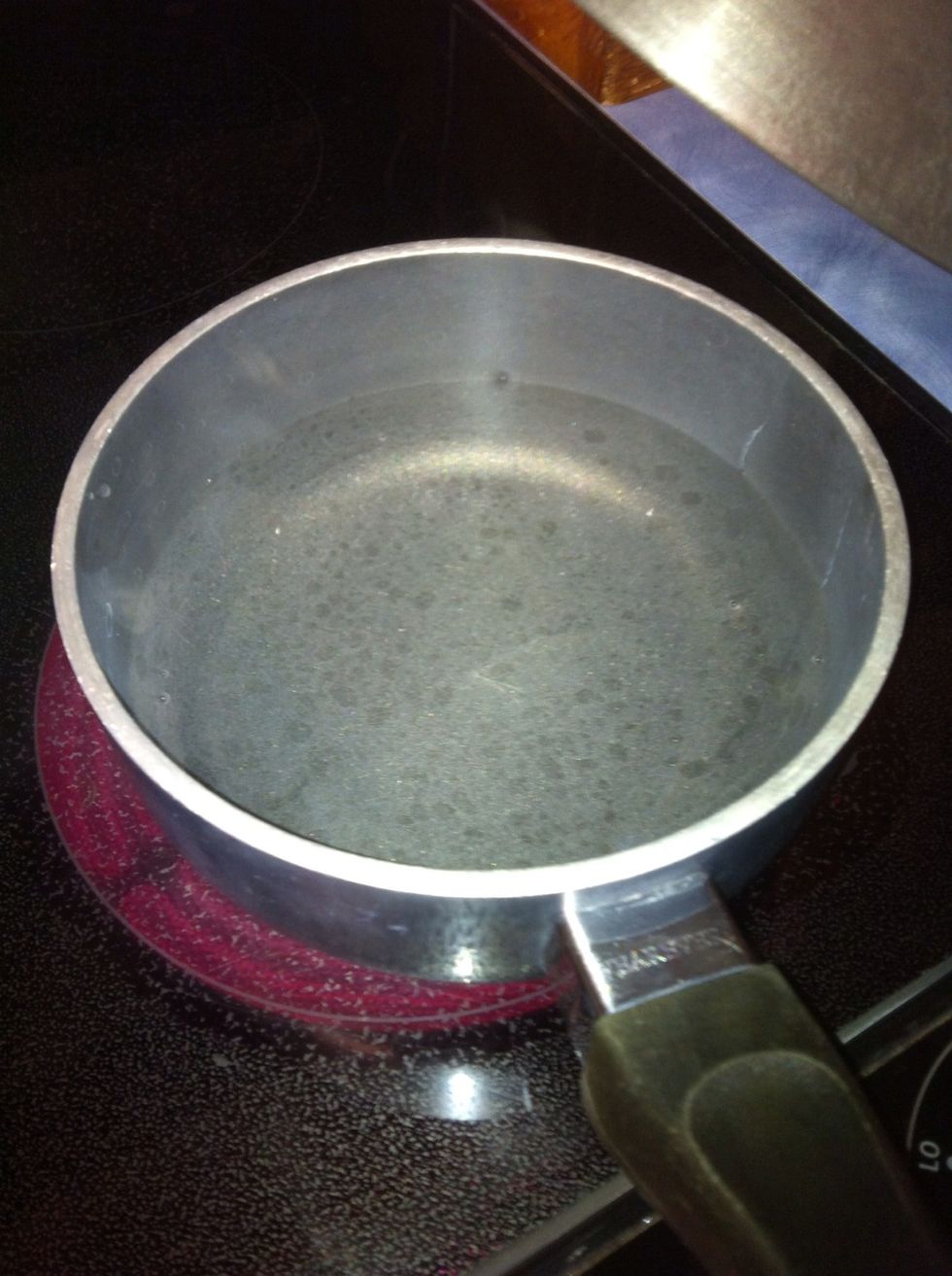 In a small pot, add water to boil.
