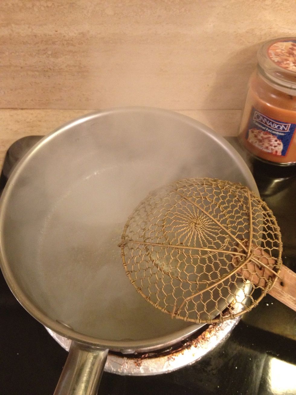 In a small pot, boil some water (enough to boil your noodle serving).