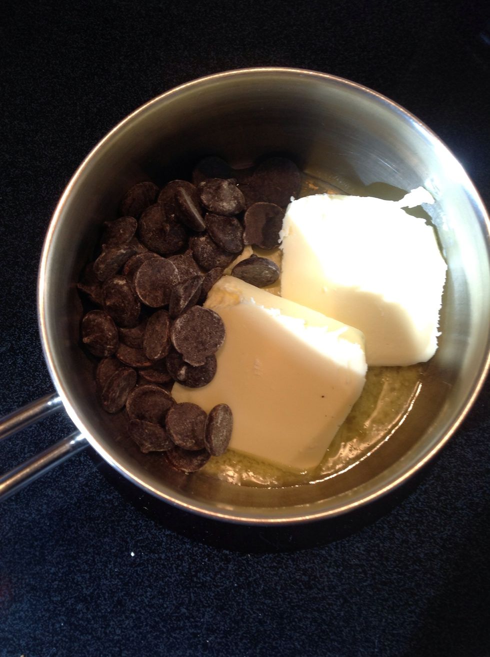 In a small pot, combine the butter and the chocolate chips