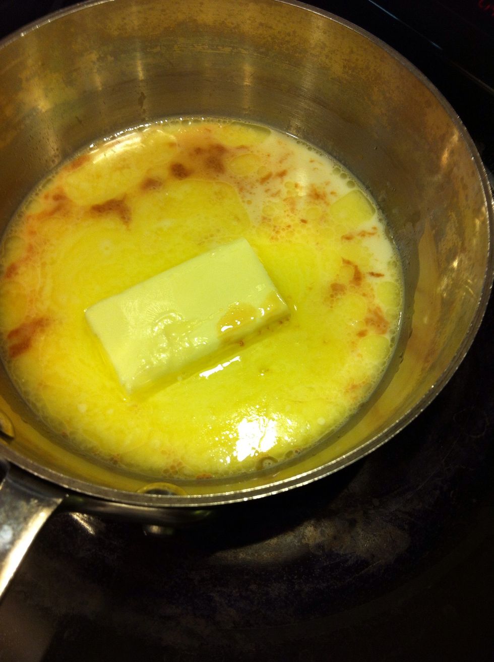 In a small sauce pan add: 4 TB butter, 2 tsp vanilla and 1/3 c milk. Let this warm up until butter melts