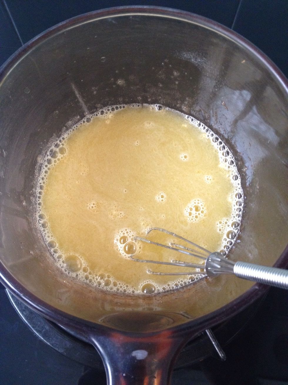 In a small sauce pan, pour in the orange juice and add the gelatine. Place on low heat and stir until gelatine is dissolve. Set aside to cool.