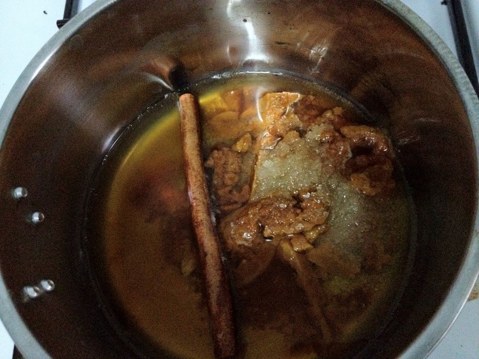 In a small saucepan, add in 1-2 tbsp of water, grated palm sugar, 1 tsp of granulated sugar and cinnamon stick. Plus a pandan leaf if you like to have more pandan fragrance