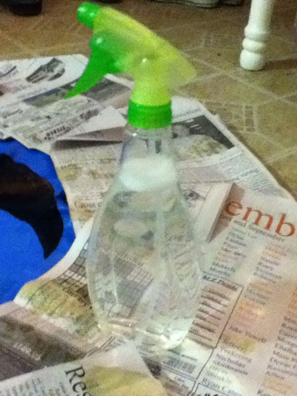 In a spray bottle mix one part bleach and two parts water