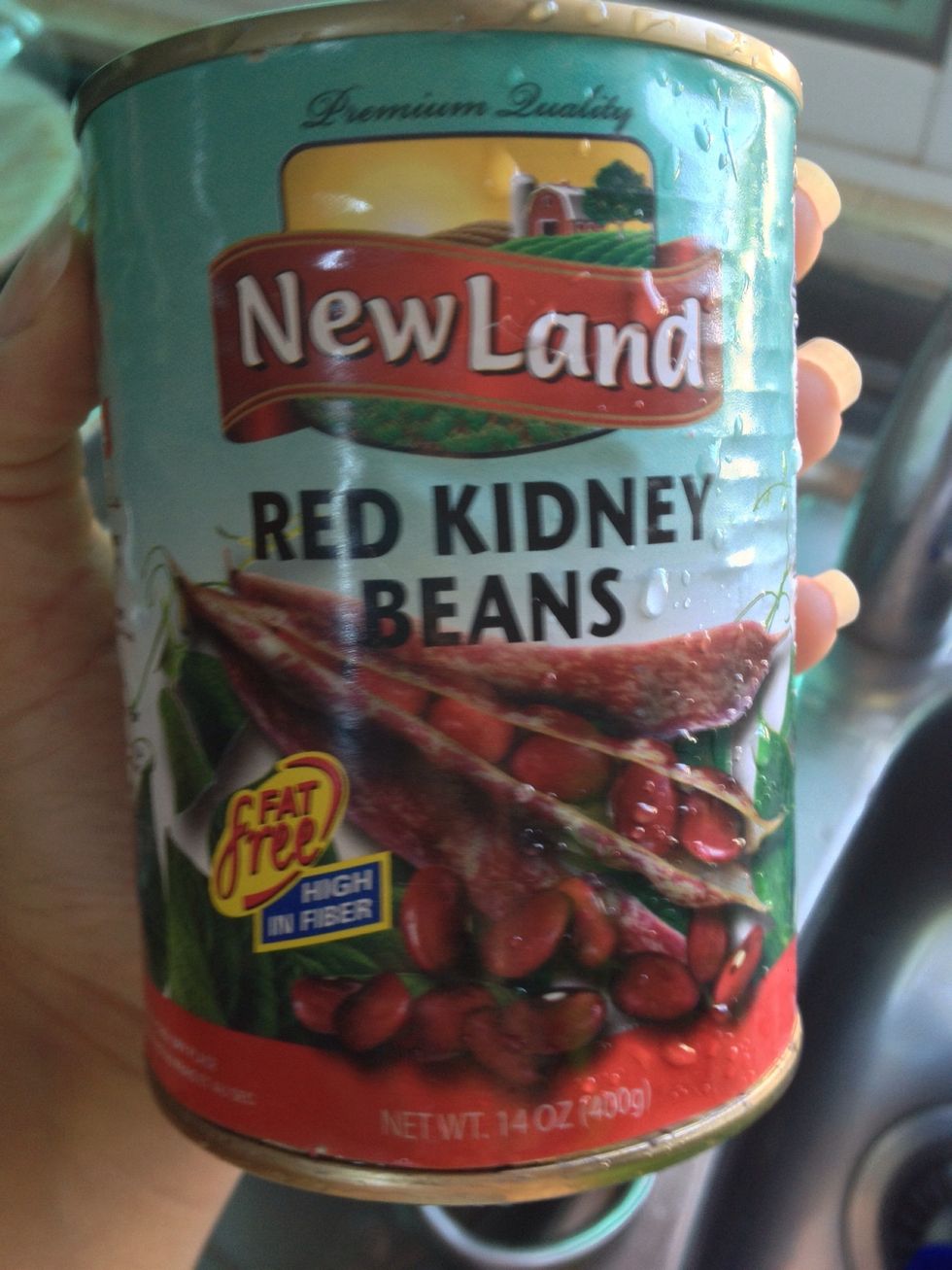 In a strainer, rinse off your kidney beans so they'll be clean and ready to add.