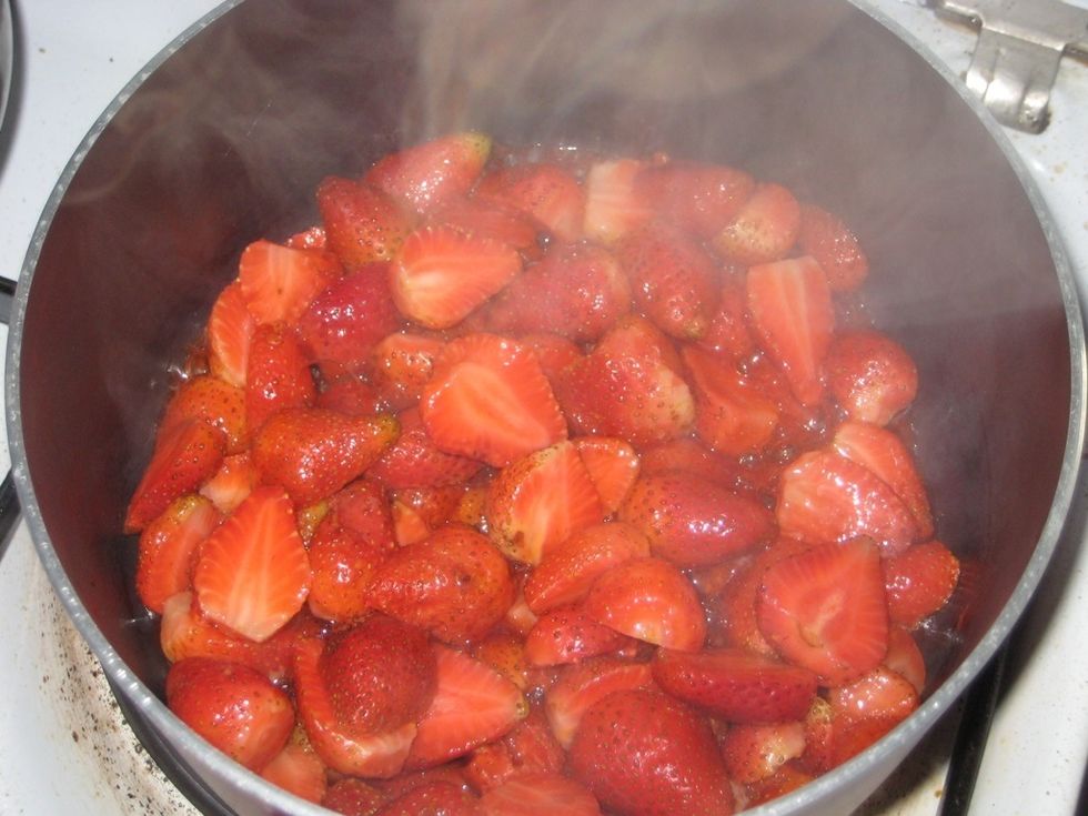 In a suitable pan, add the berries and lemon juice bring to a boil. Stir to make the lemon juice extract water out of the berries.