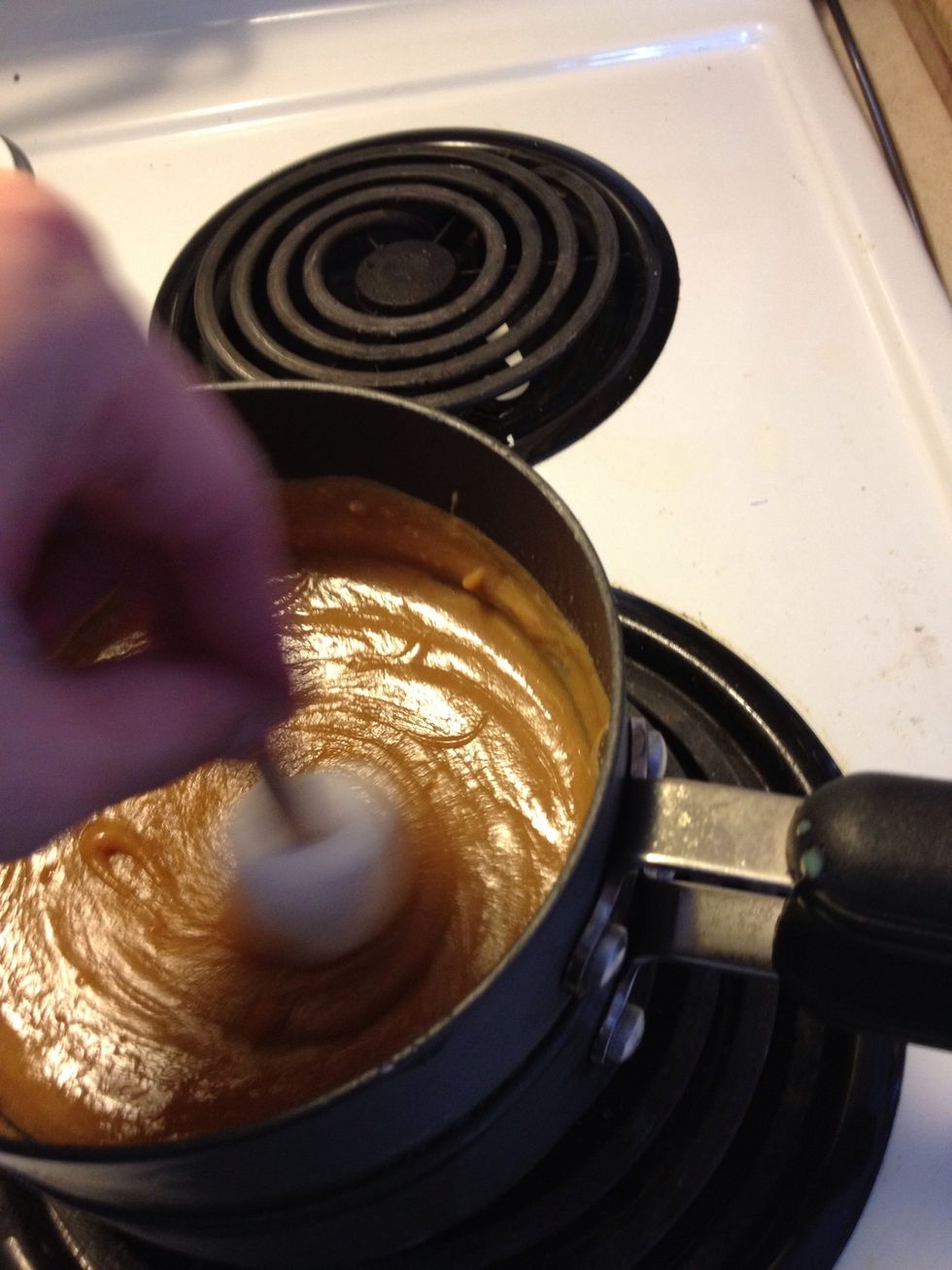 In a swirling motion with your mellow in your chocolate, coat half the mellow in chocolate.