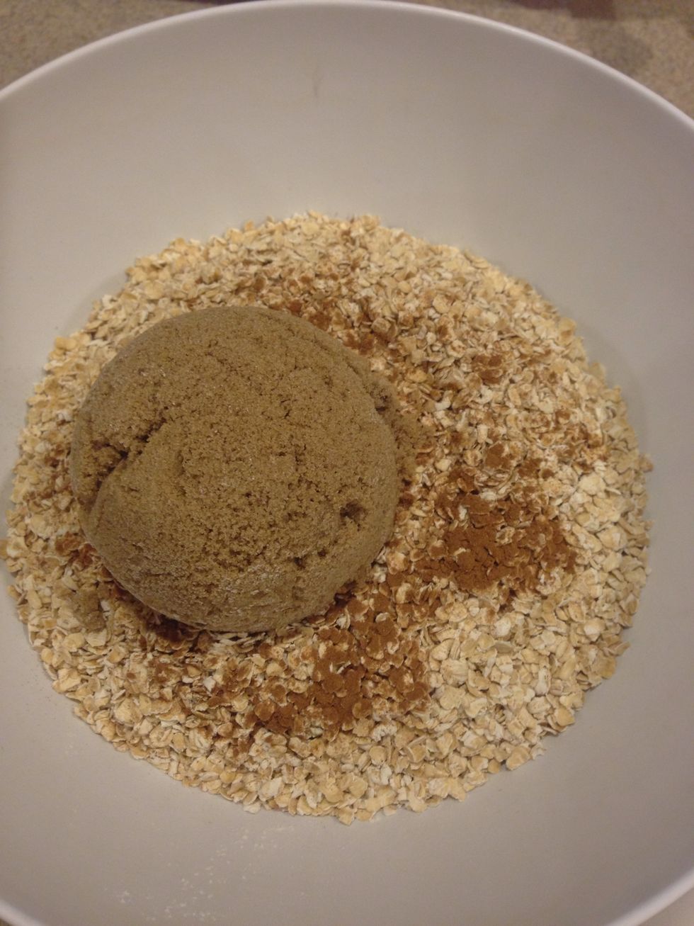 In another bowl add Flour, oatmeal, brown sugar and cinnamon. I mentioned 1 tsp of cinnamon but since I LOVE cinnamon I put a lot more. After mixing the dry ingredient, add a softened stick of butter.