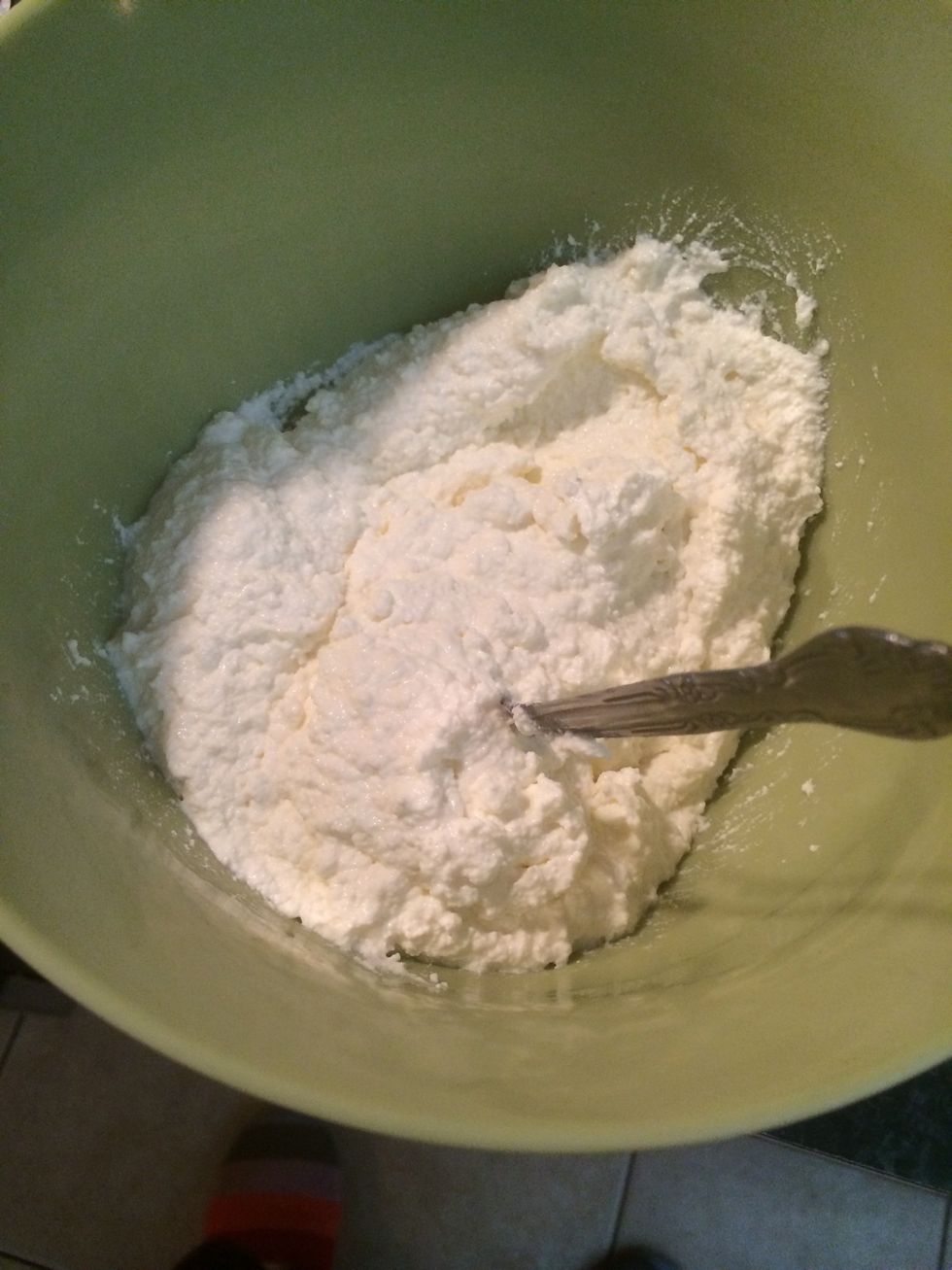 In another bowl add the container of ricotta