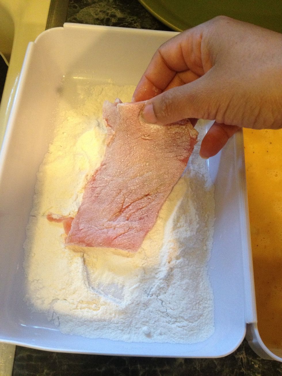 In another bowl add the flour. We will start first by dipping the veal in this manner. 1st in the flour shaking off excess.
