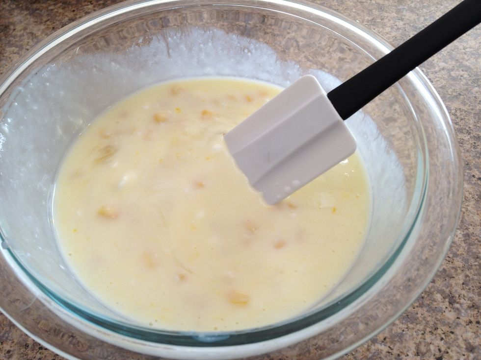 In another bowl, combine the wet ingredients: egg, buttermilk, and Greek yogurt. Mix well. And then add the corn kernels and stir.