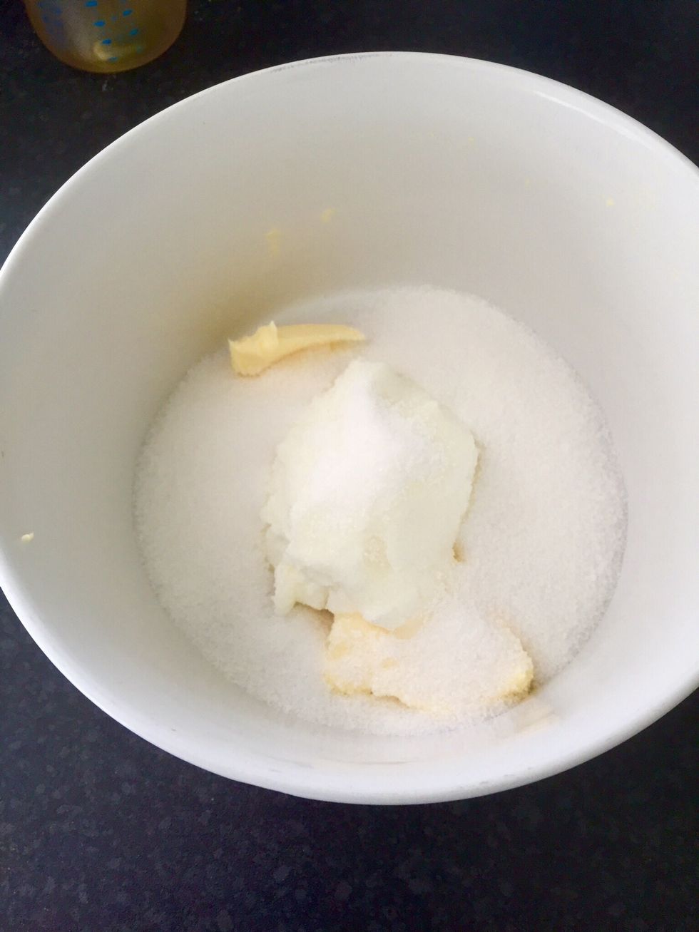 In another bowl, mix the butter, yogurt and sugar until smooth