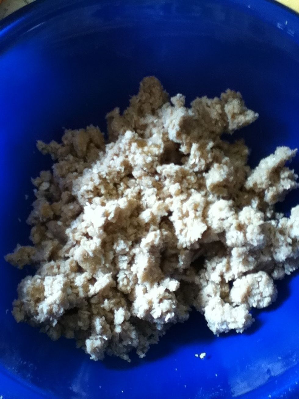 In another bowl mix together the flour, oats, brown sugar and butter until it feels like dough.
