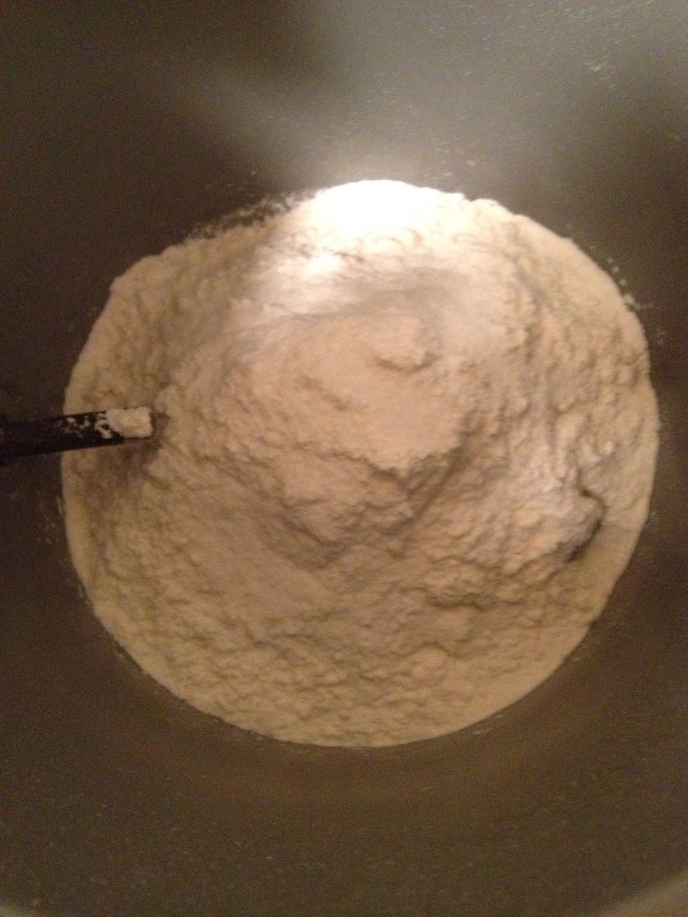 In another bowl or bread machine mix 2 cups of all purpose flour, 1 cup of bread flour, tbs of salt, tbs of sugar