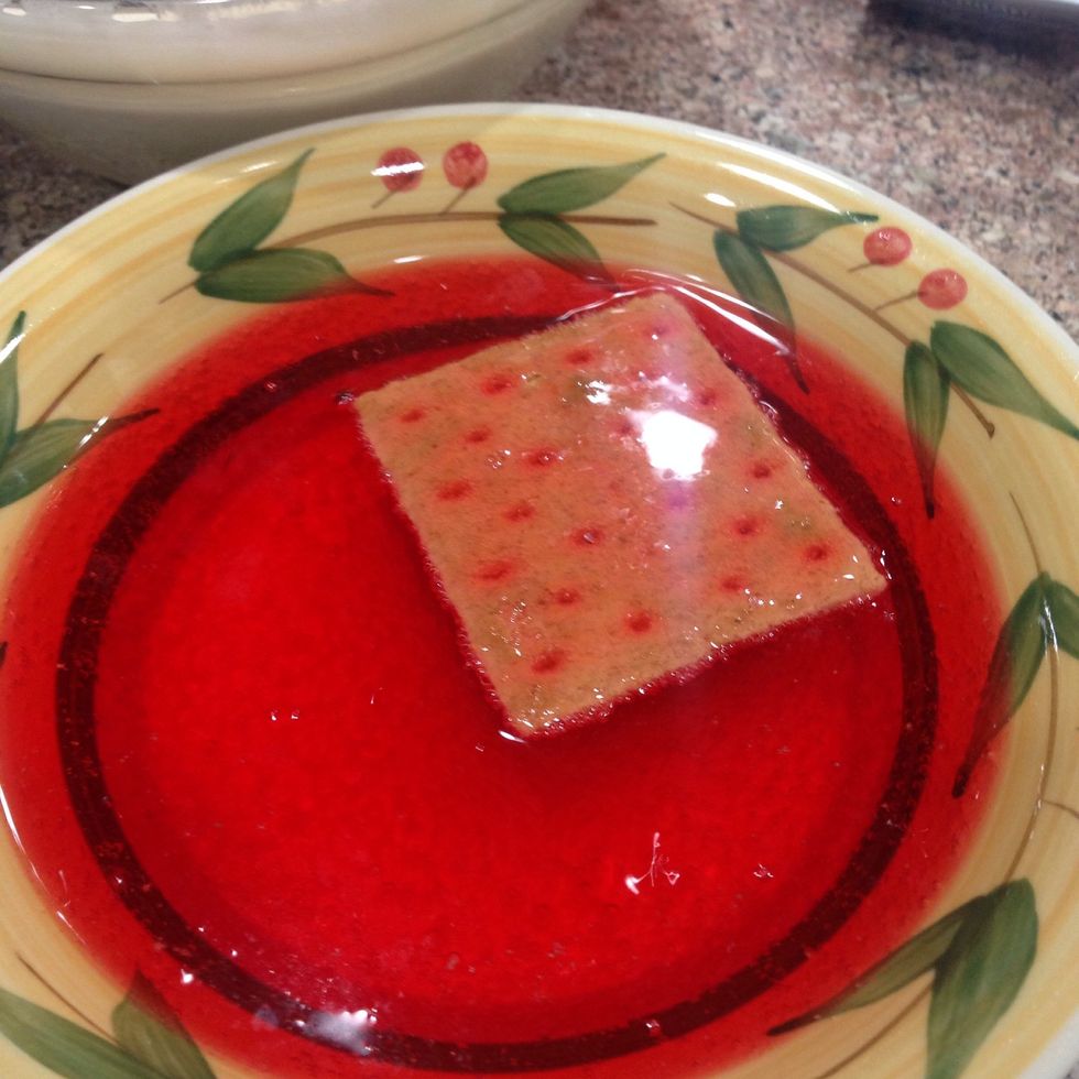 In another bowl, pour in 2 cups of fanta soda. U can use Pepsi or milk, but I like the strawberry flavour. And dip in the graham crackers.