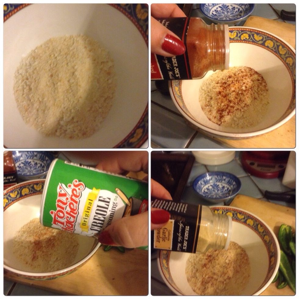 In another bowl put breadcrumbs (I used a mixture of regular breadcrumbs and panko breadcrumbs). Add a dash of paprika, garlic and if you want (I wanted!) a dash of Creole seasoning.