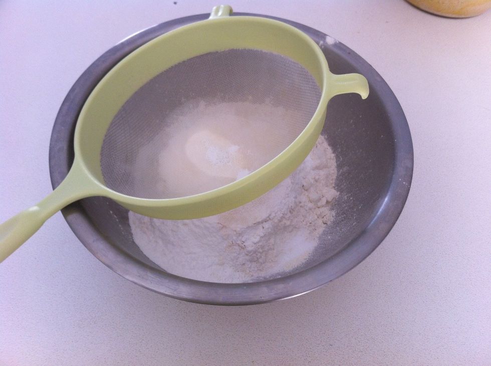 In another bowl sift the flour, the baking powder and the salt. Add this to the previous mixture.