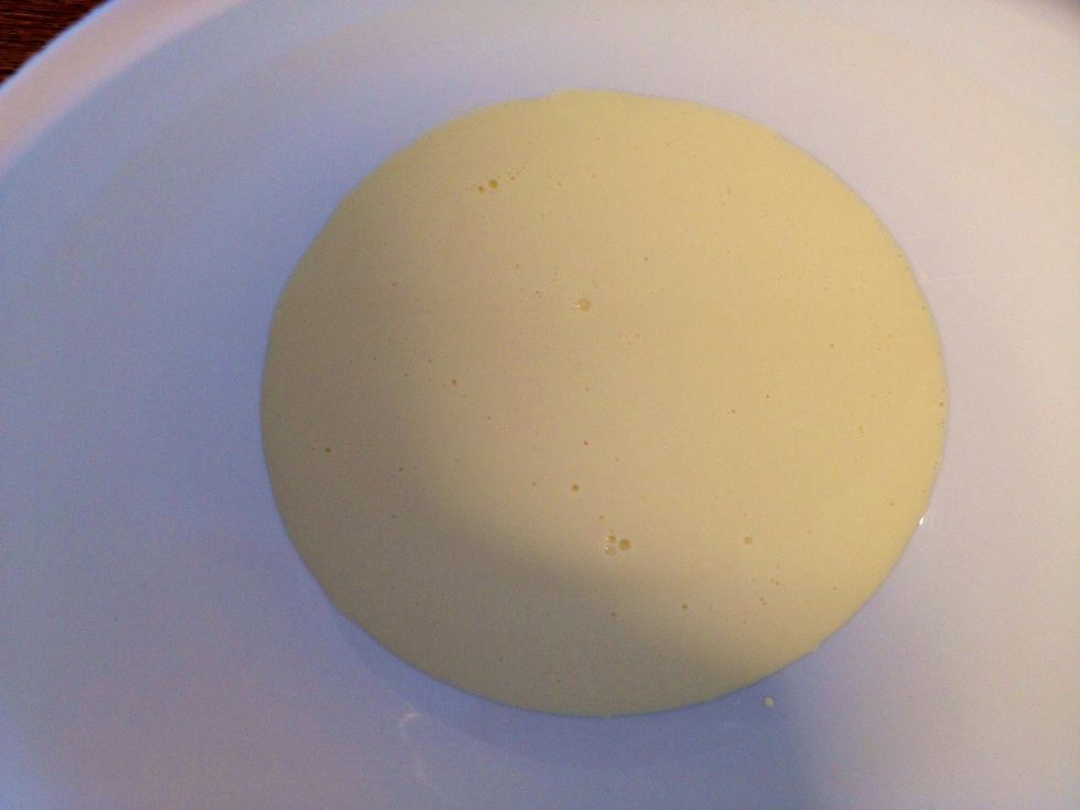 In another bowl, whisk the cream lightly.