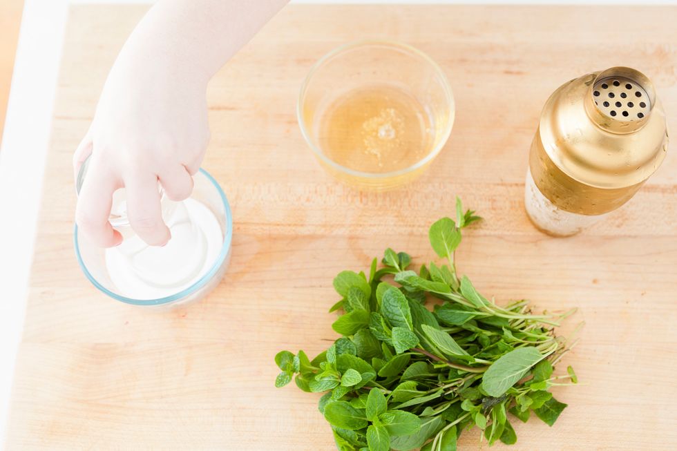 In another bowl wide enough for your glass, add sugar. After your glass is covered in agave or simple syrup, dip the rim into the sugar. Repeat process on all glasses.
