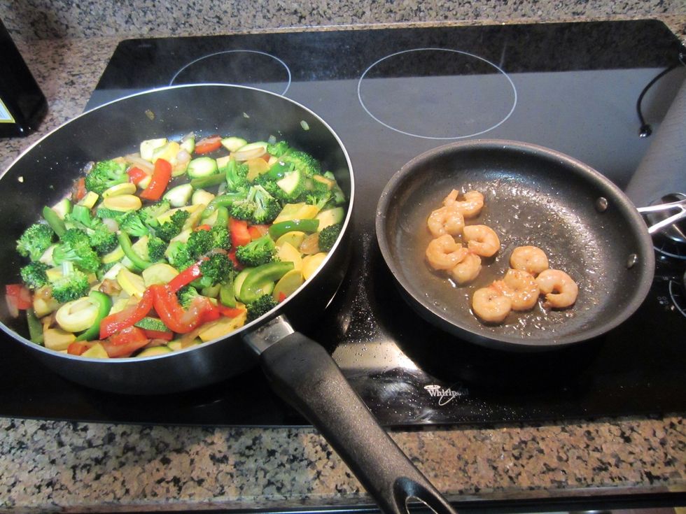 In another pan cook shrimp and feel free to add more Soy Ginger dressing to both.