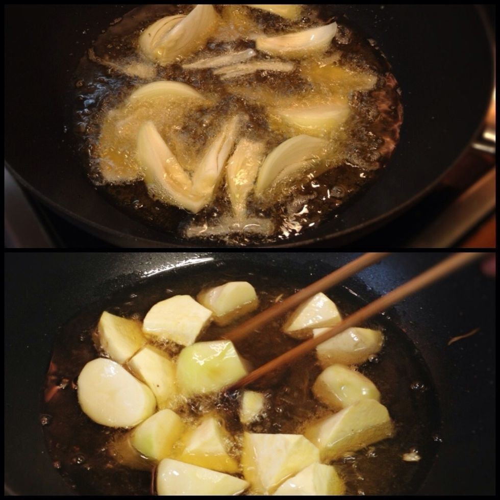 In another pan, deep fry onions and potatoes.