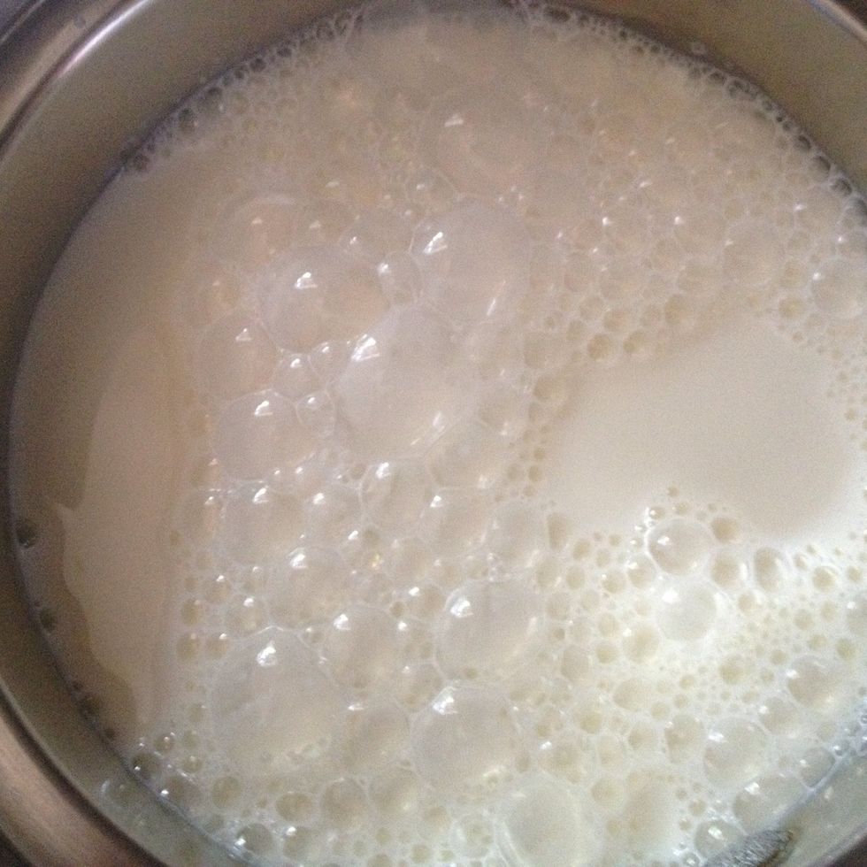 In another pan put regular milk you will need allot and put on high heat to boil