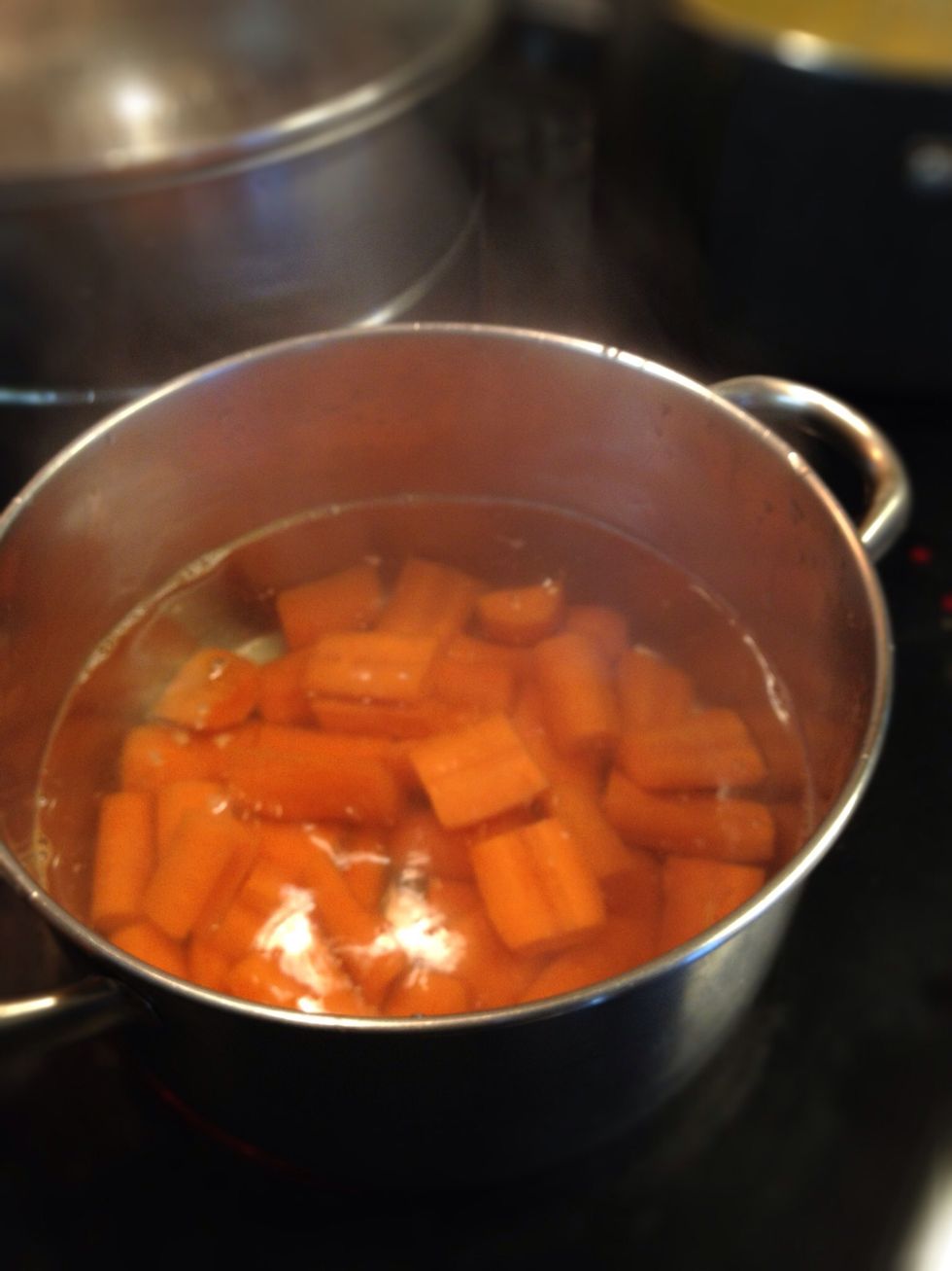 In another pot, blanch the carrots