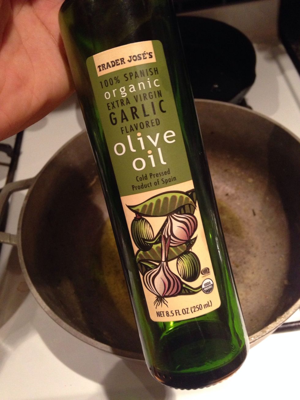 In another pot, heat up the EVOO on medium heat. My EVOO has garlic, but you can use whatever you'd like.