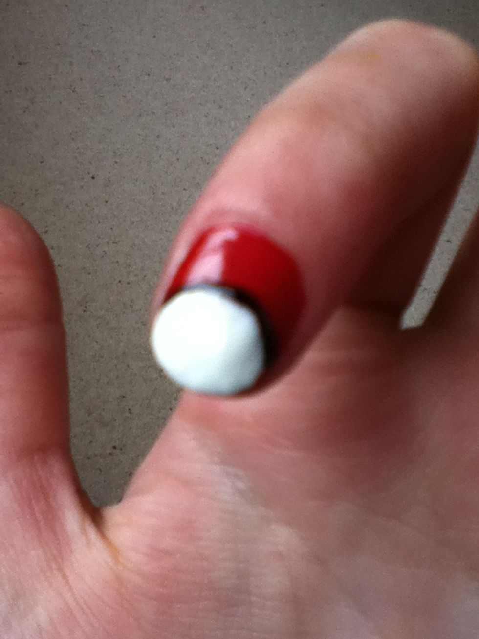 In between the red and white, draw a black line.