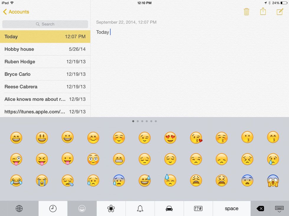 In default settings you should be able to press the smiley face button, it'll give you access to the emoji keyboard.