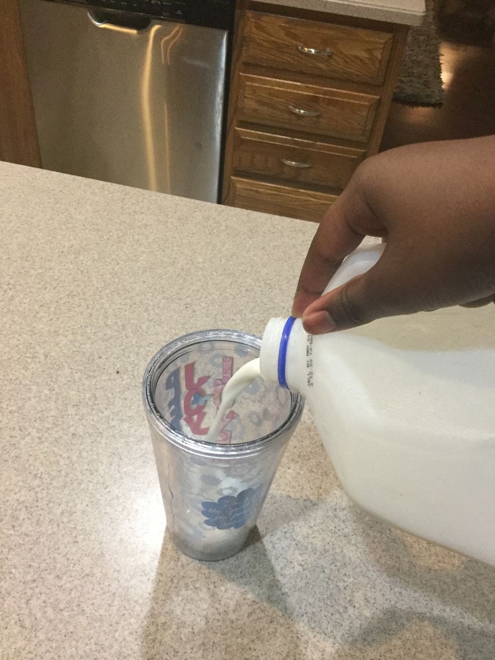 In desired cup poor some milk half of the desired cup