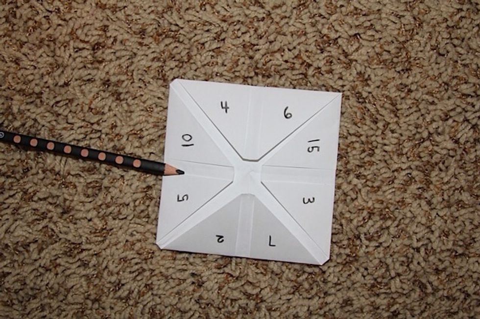 In each little half flap, write either a number or word!