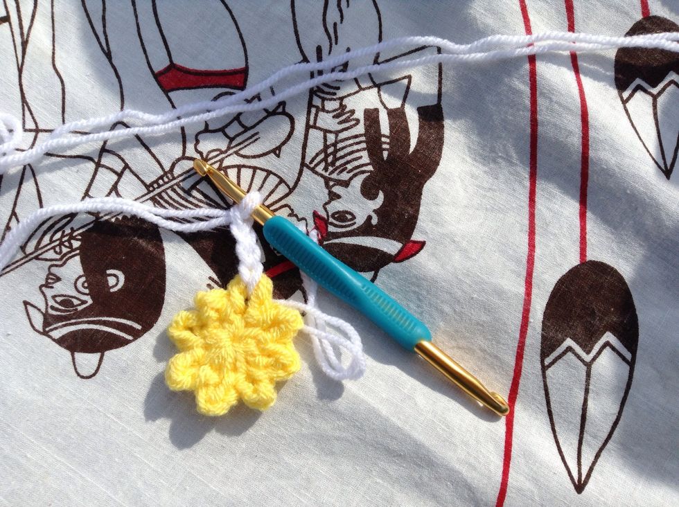 In each loop around the flower, work *1 sl st, ch 3,