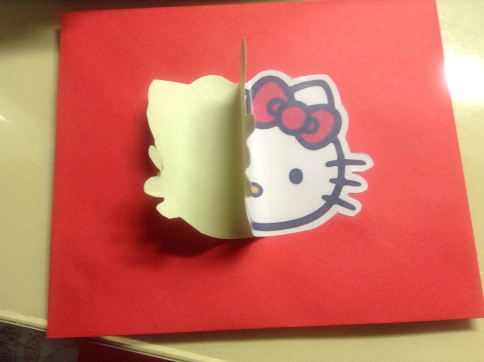 In front of the envelope stick on the Hello Kitty face clip art or the clip art of your choice. Just be sure that you are sticking it in the middle of the envelope :) be careful when sticking it!
