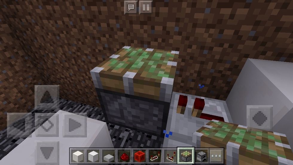 In front of the last redstone repeater, place a sticky piston, sticky side facing up, one block off the ground.