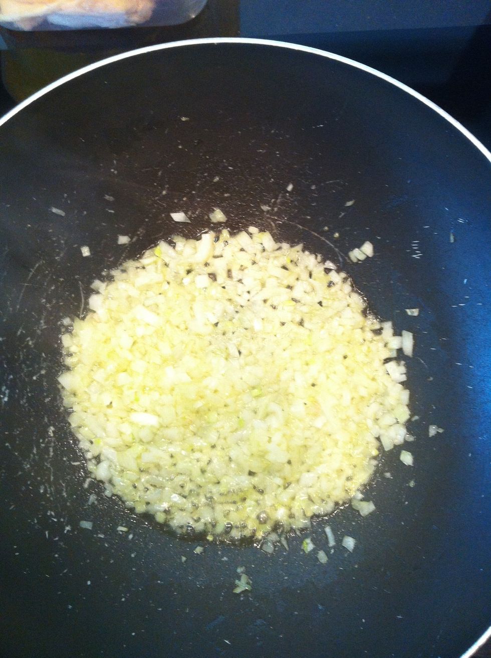 In goes the onion with a bit of butter and oil