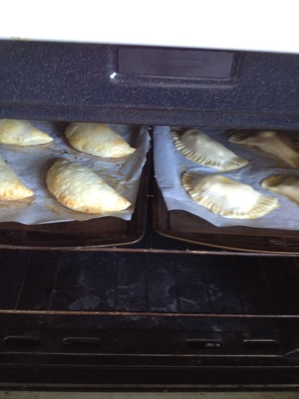 In goes the second batch! See how nicely the first batch (on the left) is coming along and starting to puff up and turn golden?! Can you smell them?!