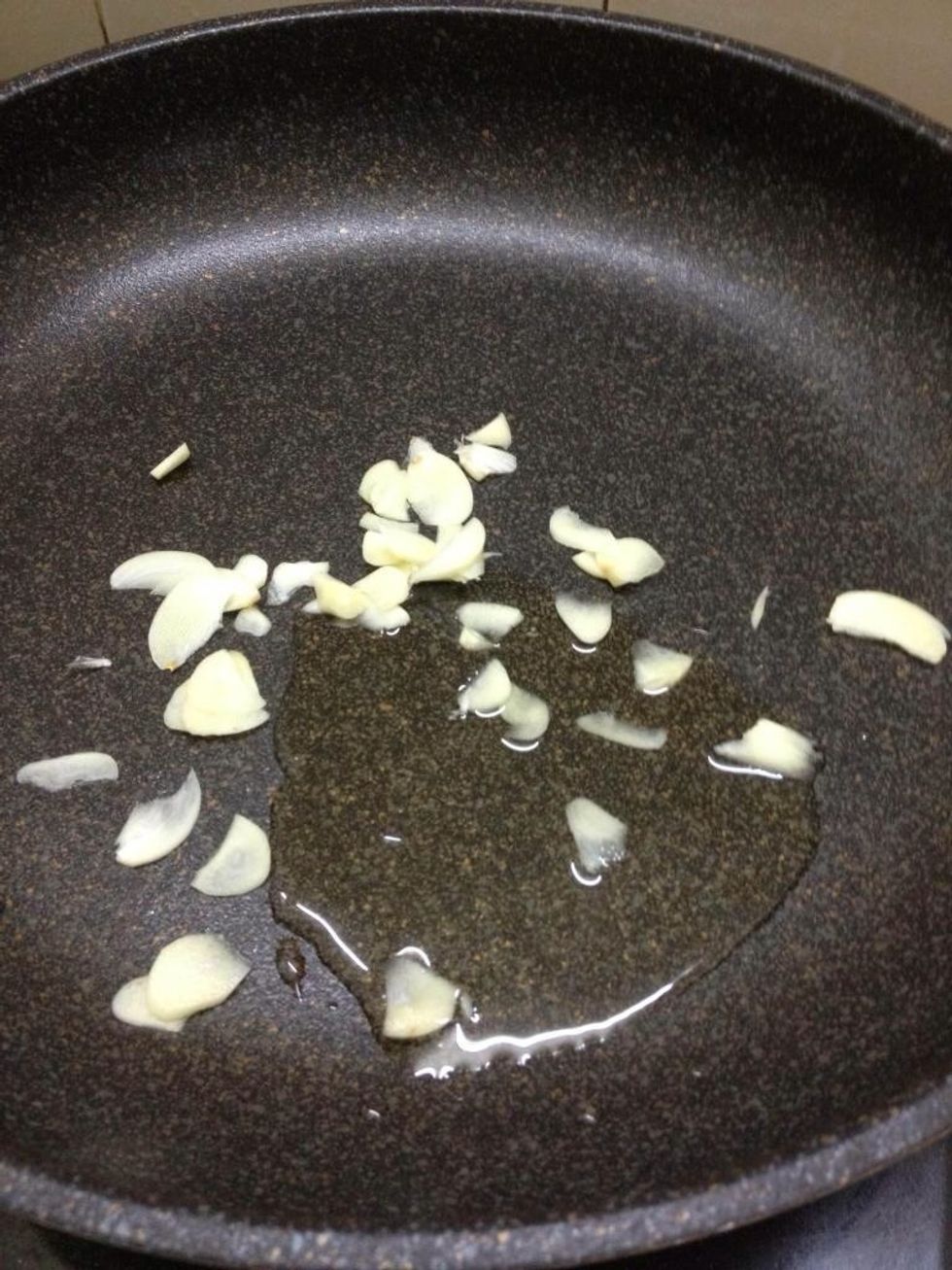 In hot pan, put butter till it melt, then minced garlic