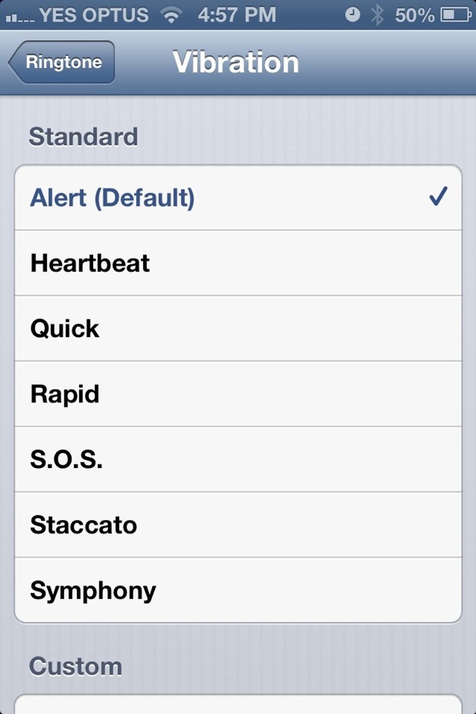 In iOS 6 you can add a custom vibration pattern by going to Settings > Sounds > Ringtone > Vibration.  From here you can chose a custom vibration or create your own.