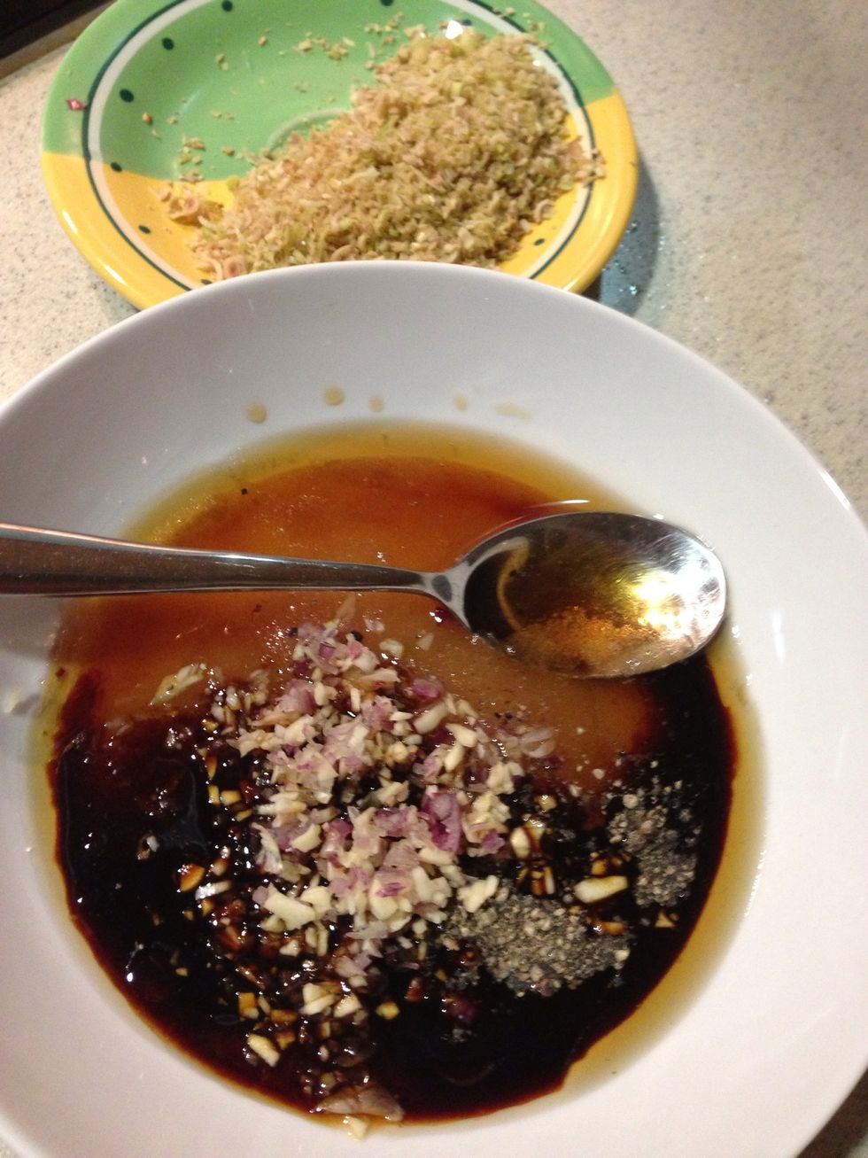 In large bowl, combine garlic, shallots, lemongrass, sugar, pepper, fish sauce, and thick soy sauce , & sesame oil.