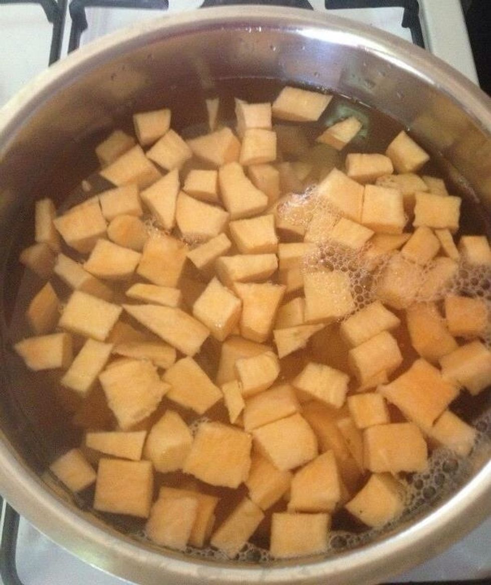 In large stockpot put the chopped sweet potato into water to bring it boil