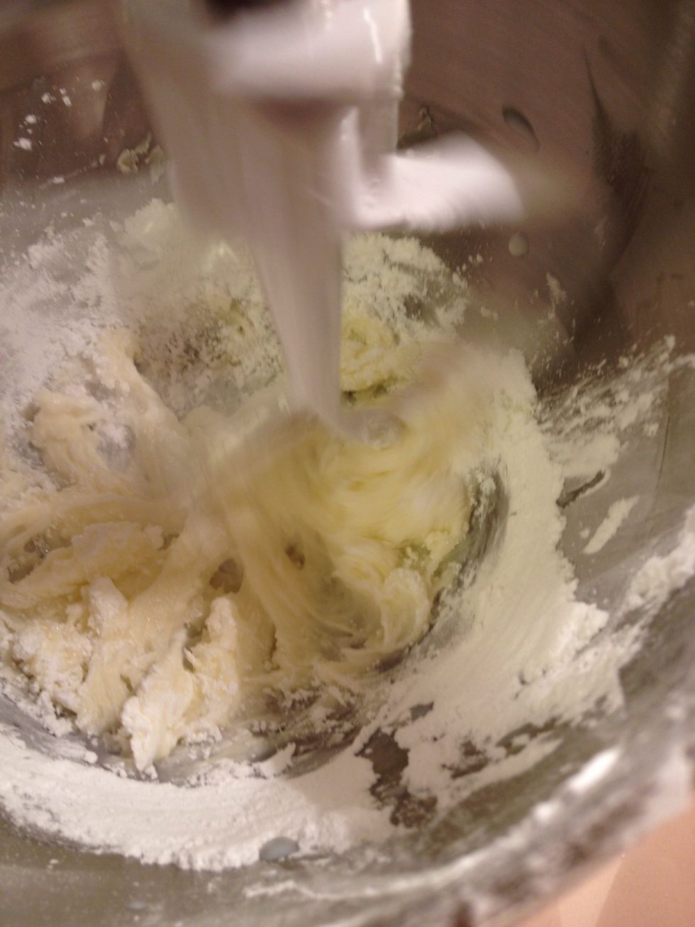 In mixer, cream butter until fluffy, then add 1/2 cup of icing sugar alternating with adding milk.