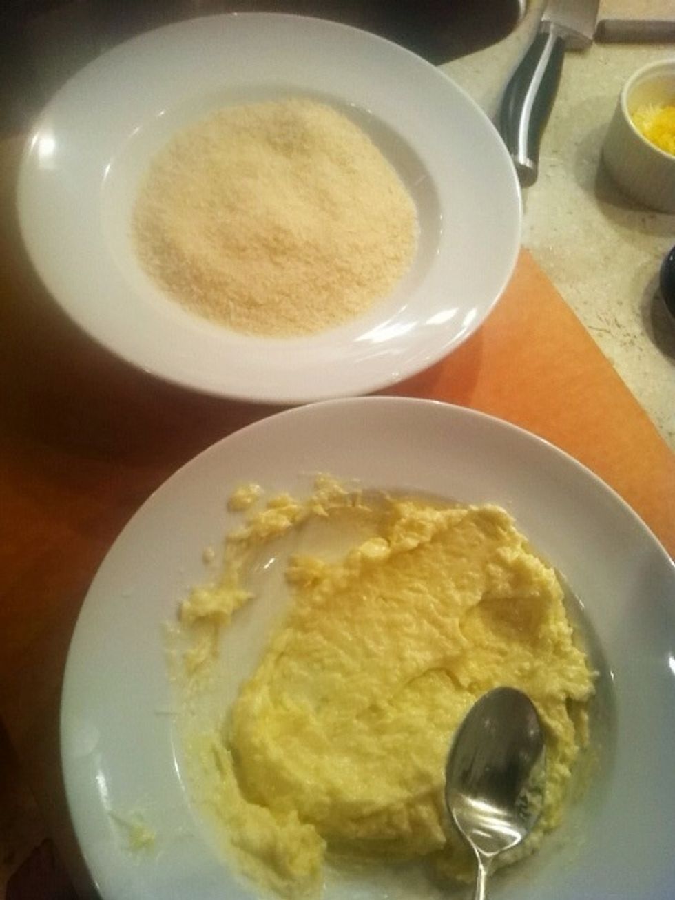 In one bowl, mix Parmesan cheese and Hellmann's mayonnaise.  In the other, add the Panko bread crumbs.