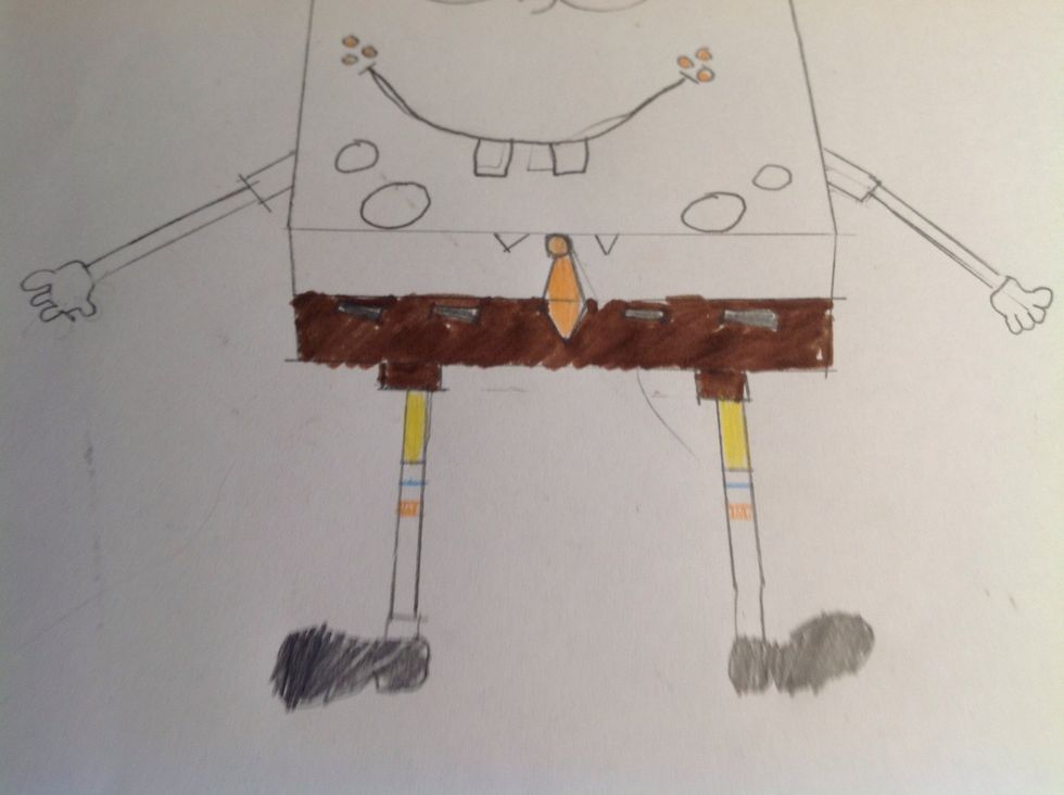 In orange or red colour in the freckles and the tie.