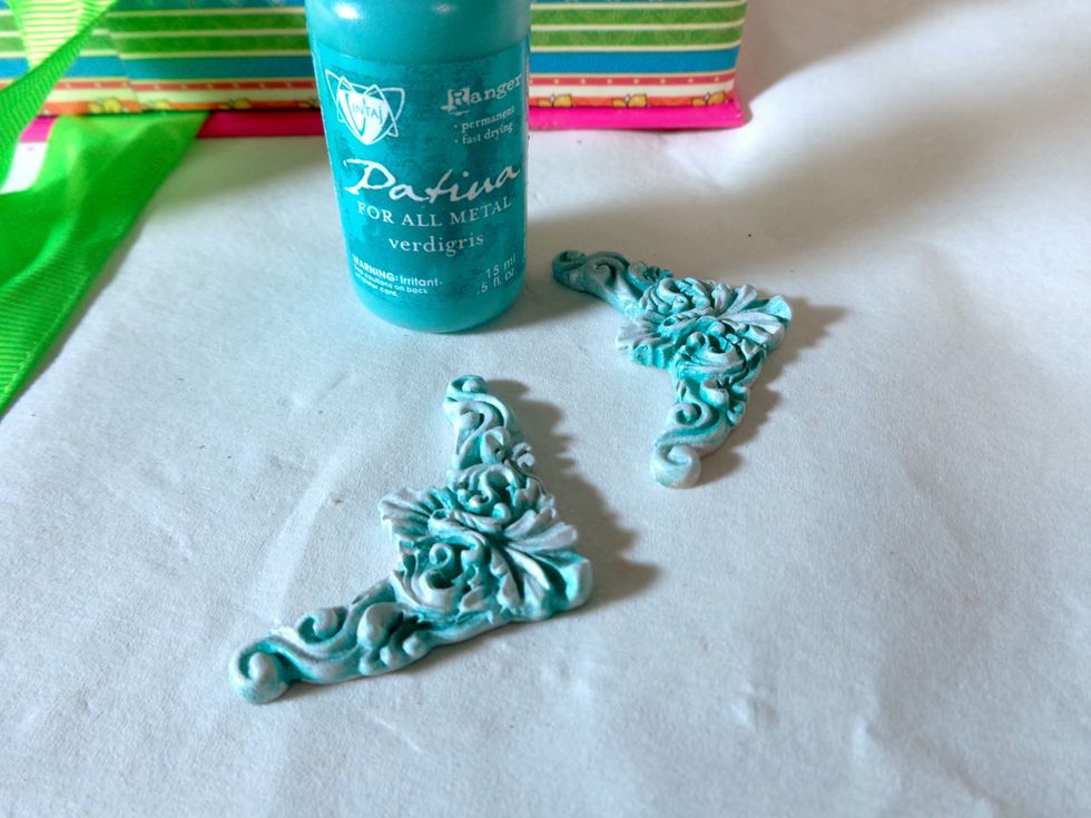 In order to give my resin pieces a little more interest, I used Vintaj Patina. I simply added it in a few spots and then wiped it off, letting a bit of the color stay in the crevices.