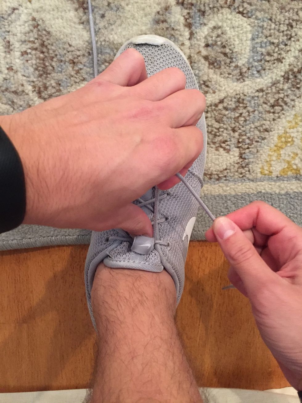 In order to make the "loop" use your left index finger to make a hook in order to double to lace over to begin to form the "loop"