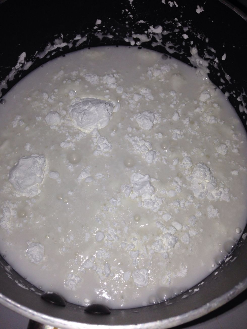 In other pan, add 1 can of coconut cream, 2 table spoon sugar, pinch of salt, and 1 teaspoon of corn starch. Bring it to boil on low heat.