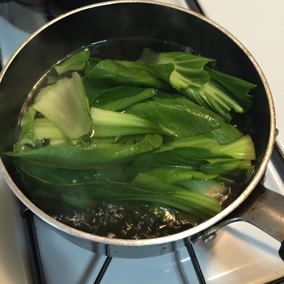 In other pit, boil water and add bokchoy in it. Let it cook for 3-4 min and drain it.